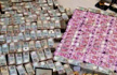 Chitradurga: I-T dept seizes Rs 5.7cr new notes, bullion from bathroom safe